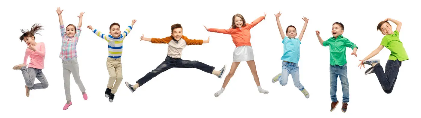 Happy children jumping in the air in various poses